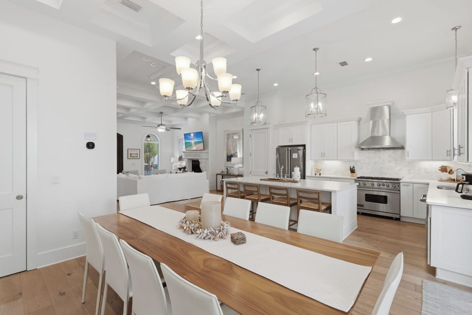 You'll love creating memories in this bright, open kitchen and dining space with elegant fixtures and modern amenities.