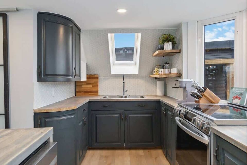 Modern kitchen with large oven and Keurig coffee machine - Upstairs Mason's View