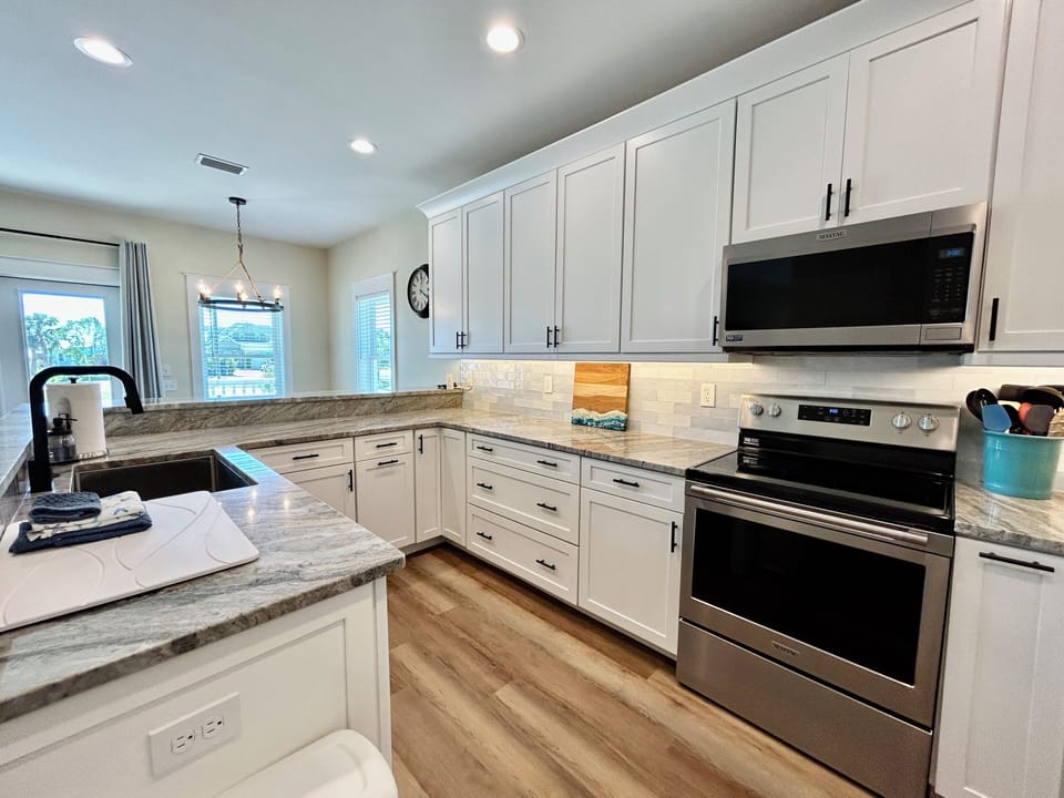 Kitchen - plenty of pots, pans, blender, toaster, slow cooker, hand mixer & more