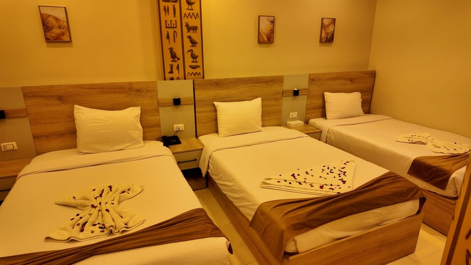 Triple Room, City View | Iron/ironing board, WiFi (free)