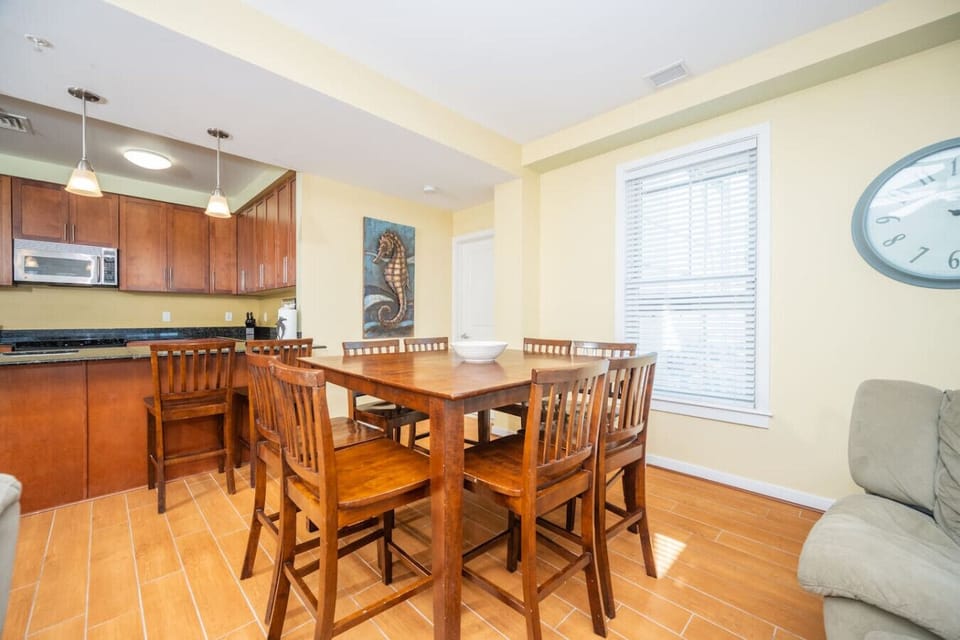 Spacious dining area with seating for the whole group—perfect for shared meals, games, and gathering together.