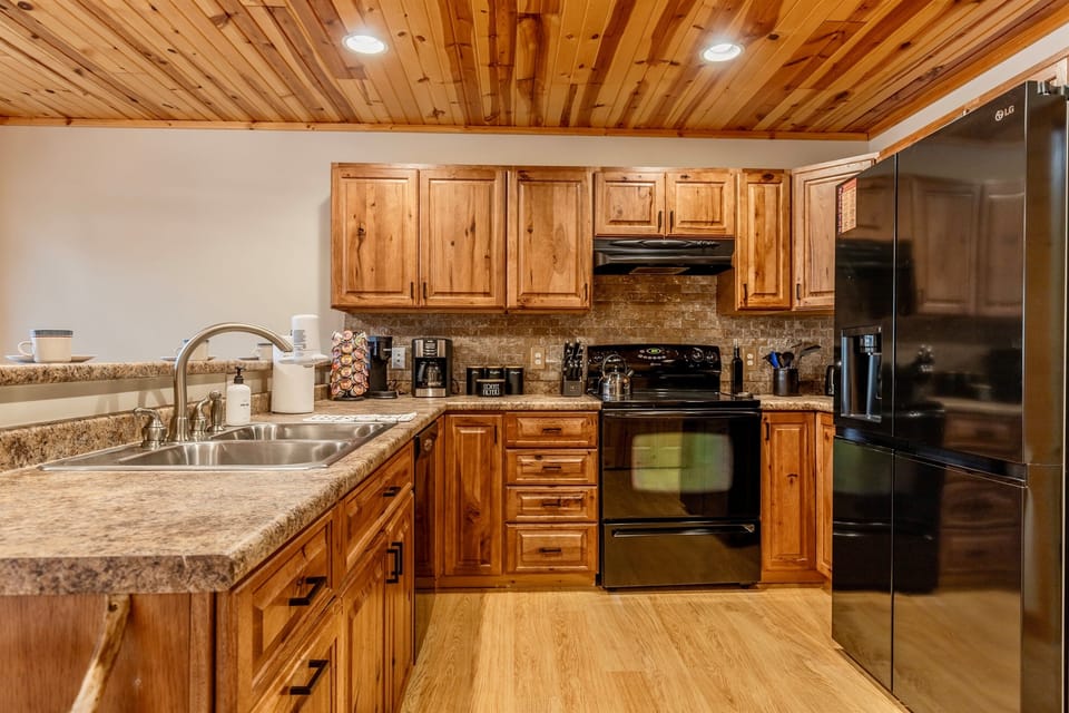 Kitchen equipped with all your essentials, including coffee, tea, sugar and coffee pods for those one cup coffee drinkers.