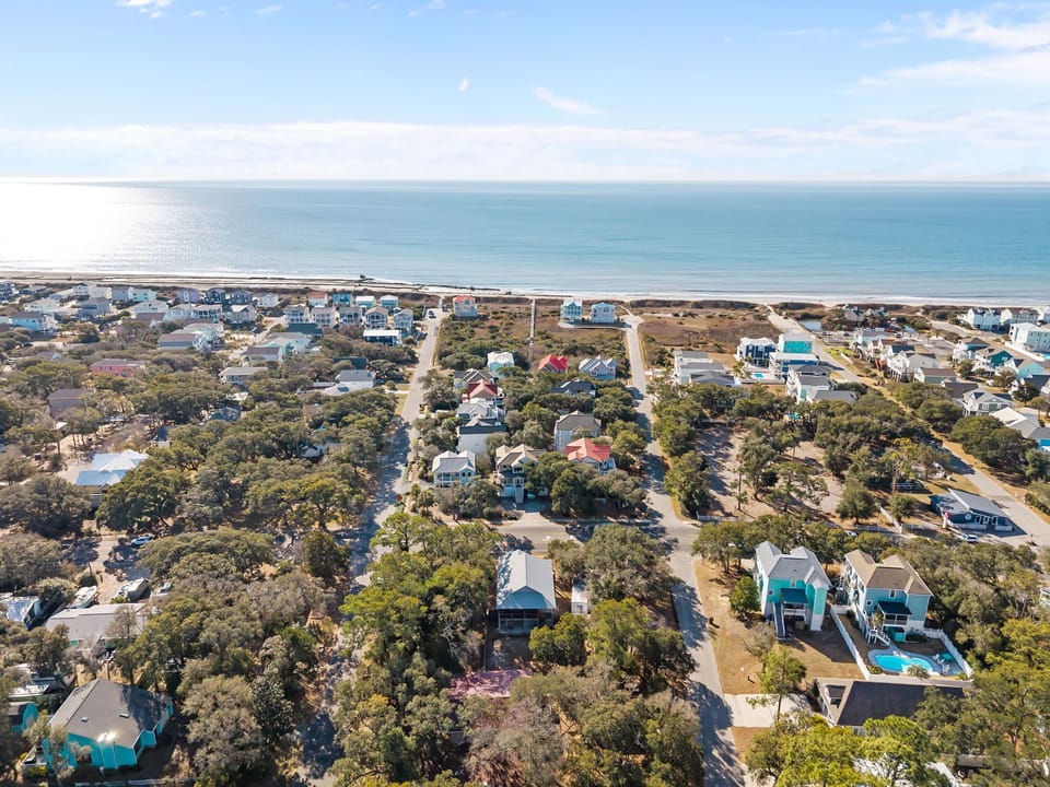 “Easy walk to 74th Beach Access—just 400 steps from the home”