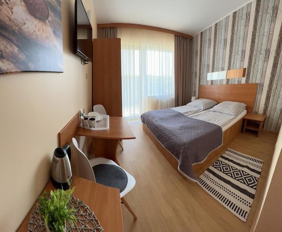 Blackout drapes, soundproofing, iron/ironing board, free WiFi