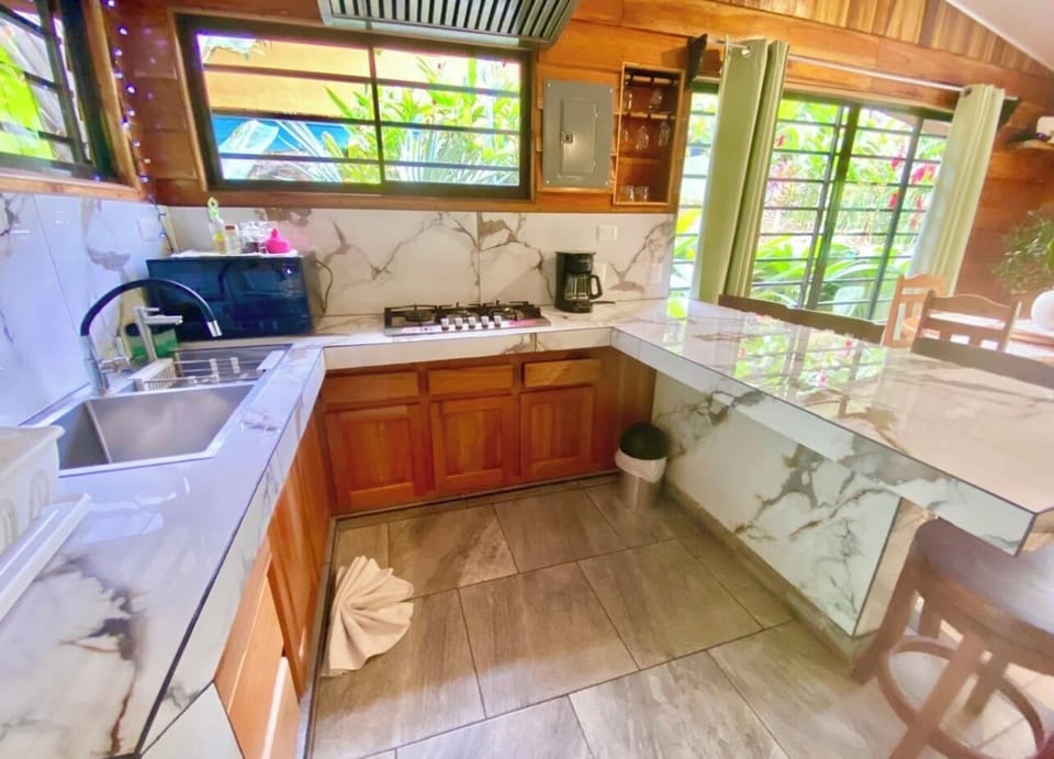Beautiful kitchen with gas stove and overhead exhaust