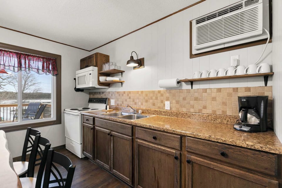 Our snug kitchen awaits you