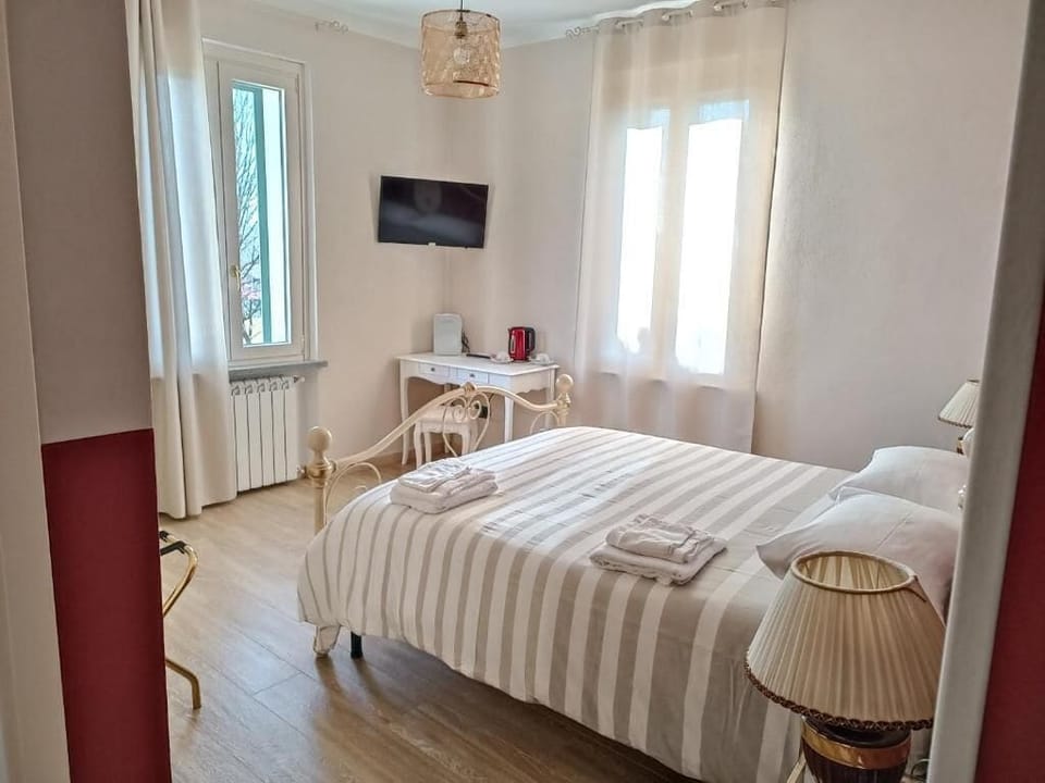 Deluxe Double Room, Pool View | In-room safe, desk, soundproofing, iron/ironing board
