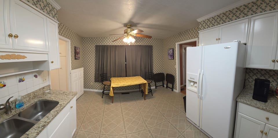 Kitchen with Eat in Table and Chairs, granite counters,  double sink