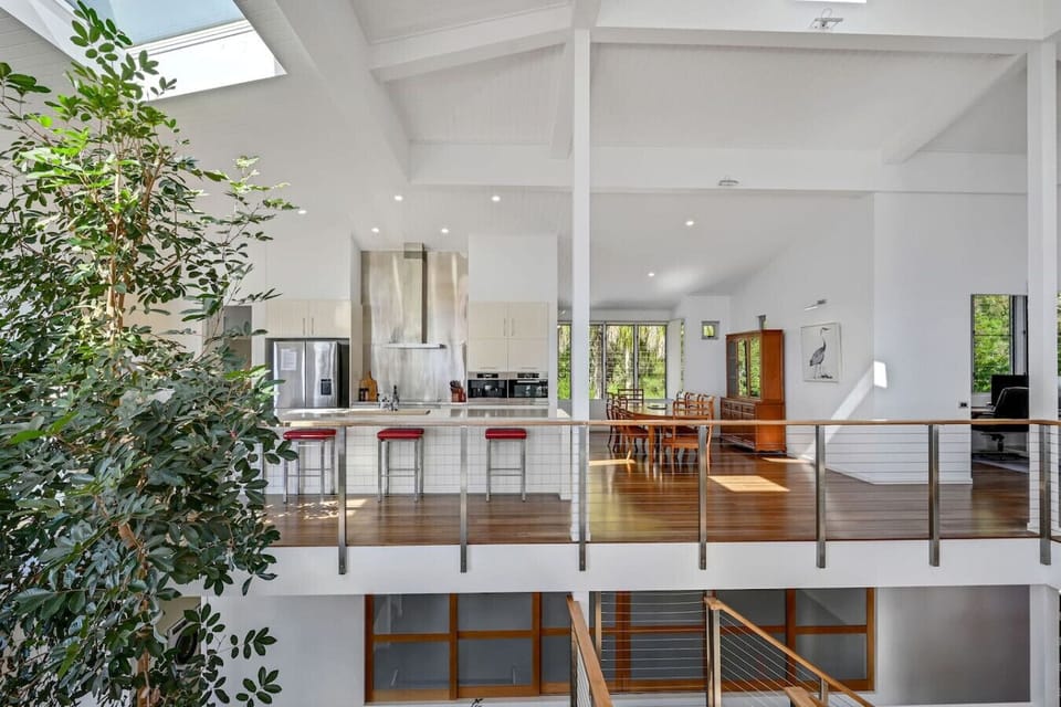 Bright open‑plan kitchen and dining area with stylish finishes and plenty of natural light.