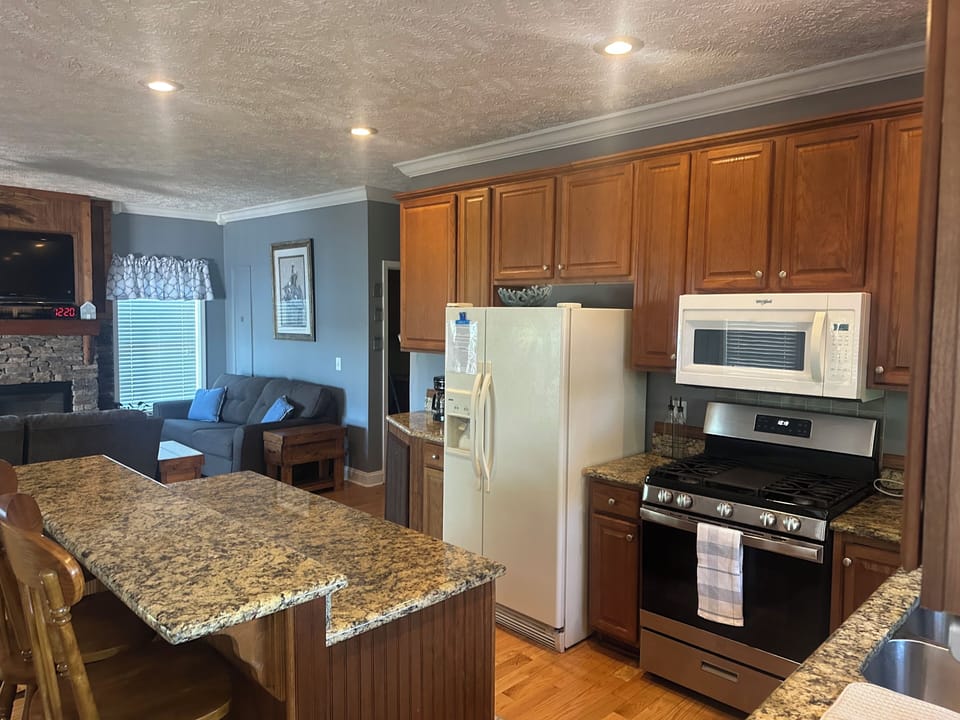 Kitchen with gas stove and dishwasher.