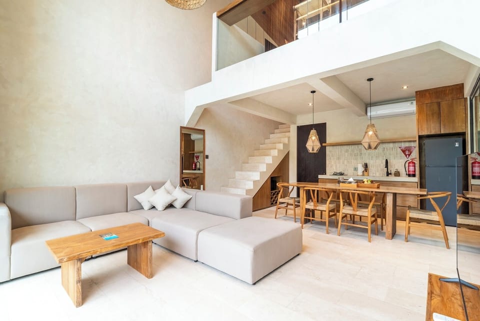 Deluxe Villa, Patio, Pool View | Living area