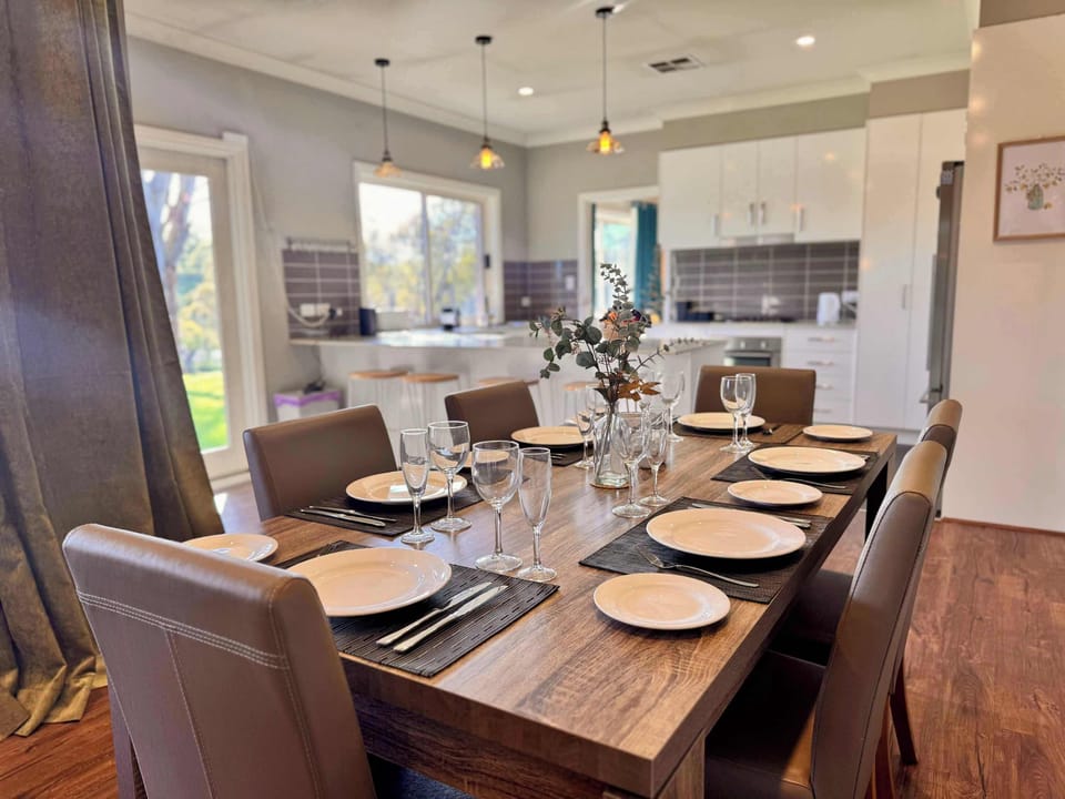 Dining area off kitchen with seating for six people