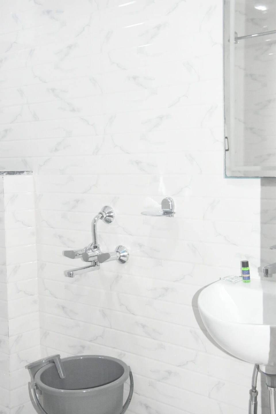 Shower, towels, soap, toilet paper