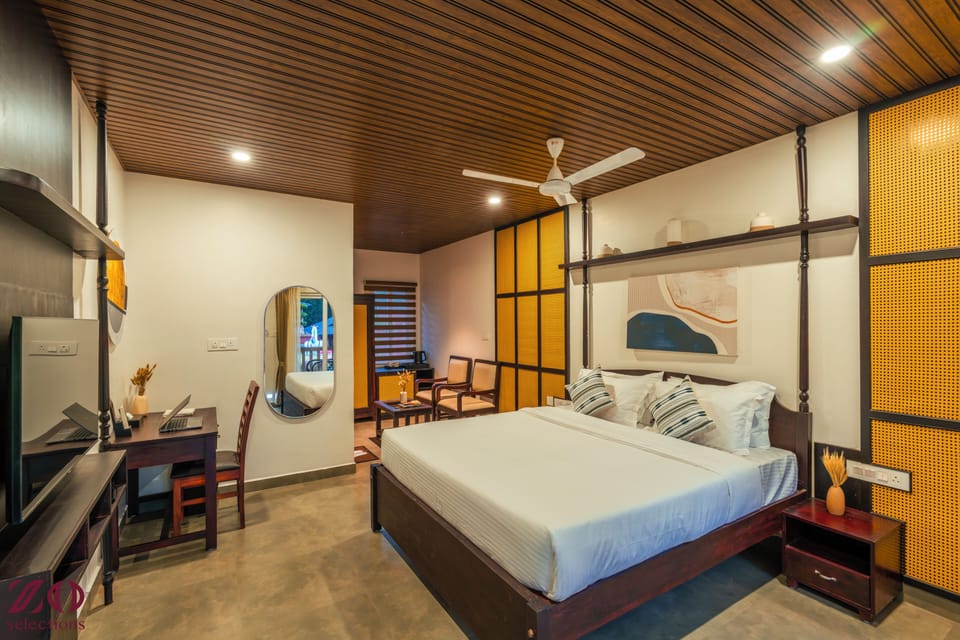 Deluxe Cottage, Balcony, Pool View | Desk, laptop workspace, free WiFi