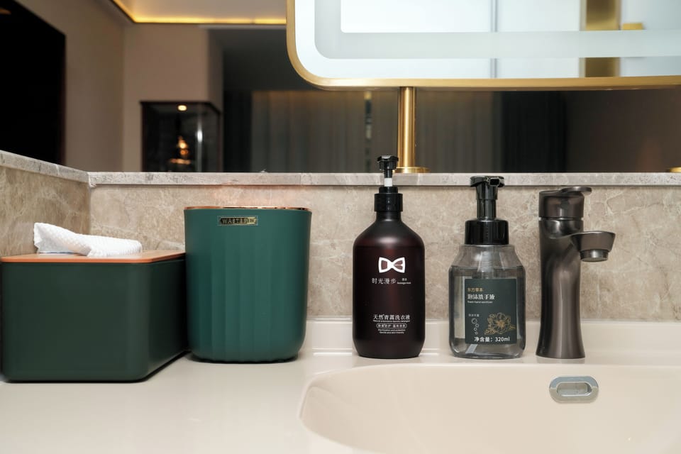 Family Quadruple Room | Minibar (free items), desk, laptop workspace, blackout drapes
