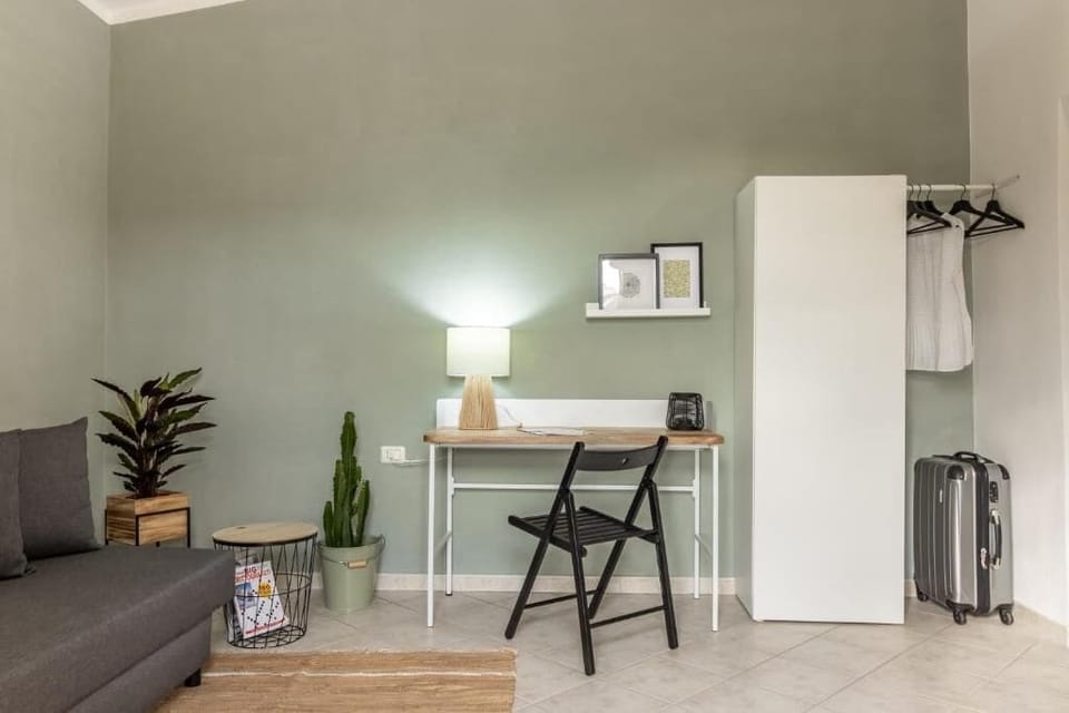 Apartment, Balcony, Garden View | Living area | Flat-screen TV