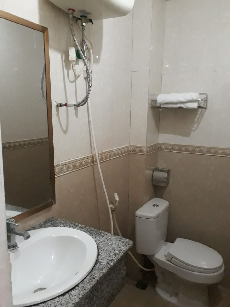 Shower, rainfall showerhead, designer toiletries, slippers