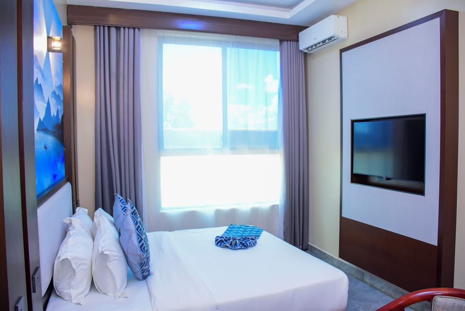 Desk, laptop workspace, free WiFi, bed sheets
