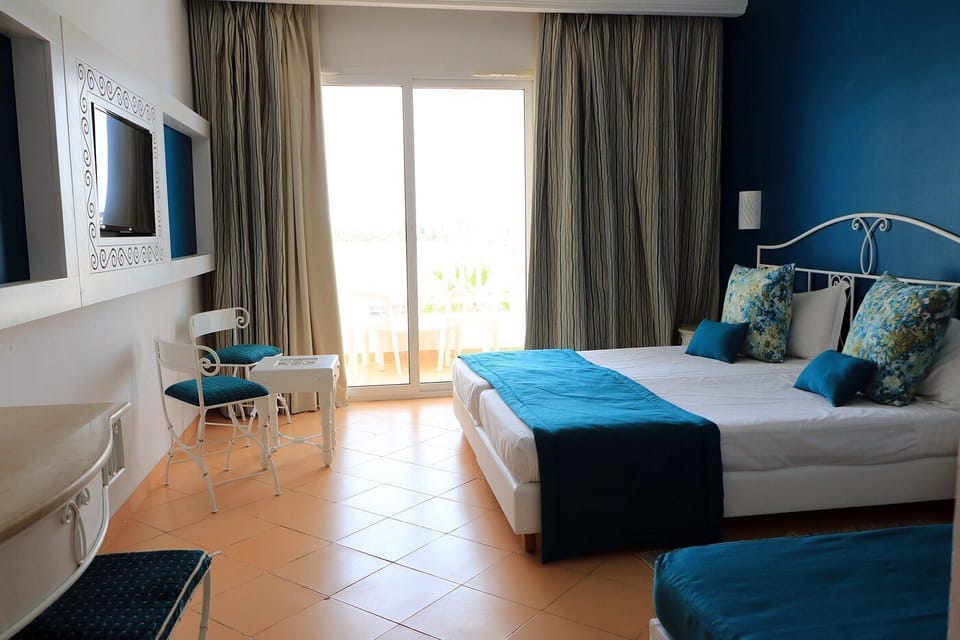 Comfort Room, Balcony | Free cribs/infant beds, free WiFi, bed sheets