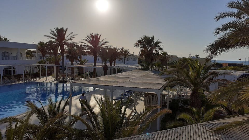 Indoor pool, outdoor pool, pool umbrellas, sun loungers