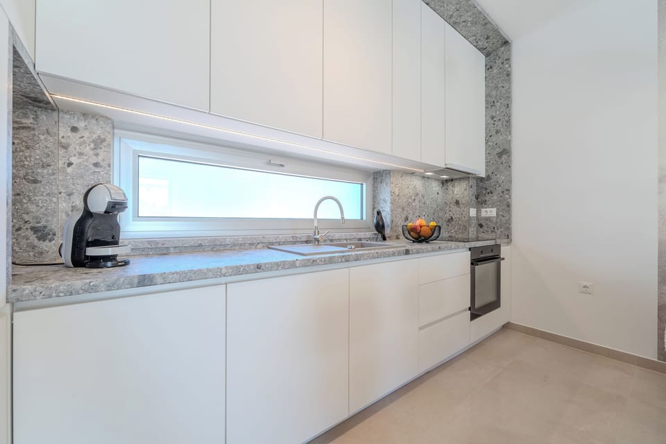 Villa | Private kitchen | Espresso maker, coffee/tea maker, fridge, microwave