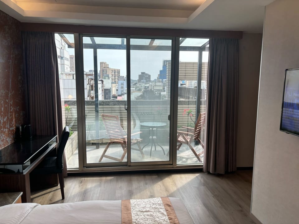 Deluxe Balcony Room | Down comforters, minibar, in-room safe, desk