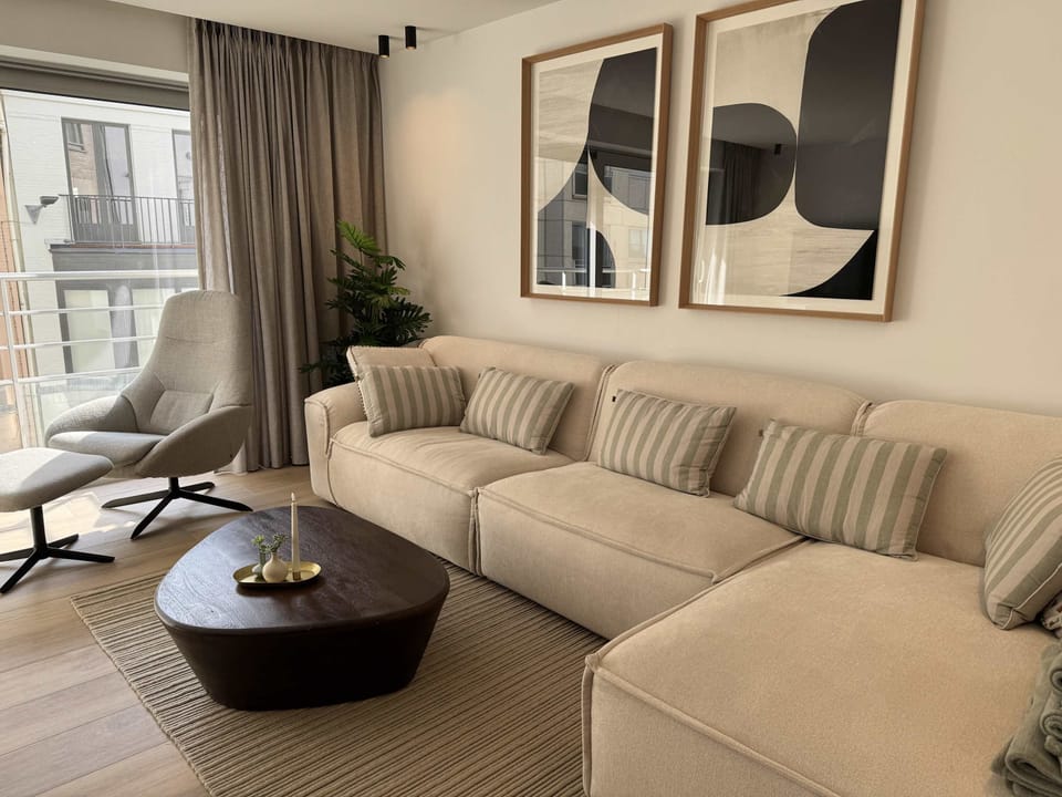Bright and elegant living room with soft neutral tones.