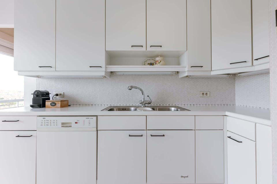 Kitchen with coffee machine