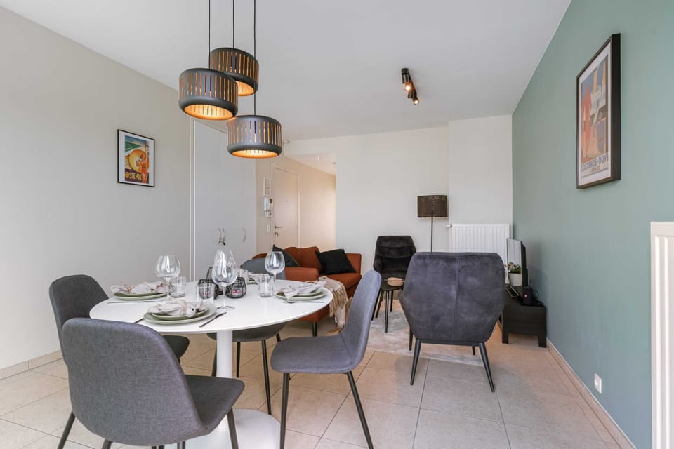 Light filled living area with dining table
