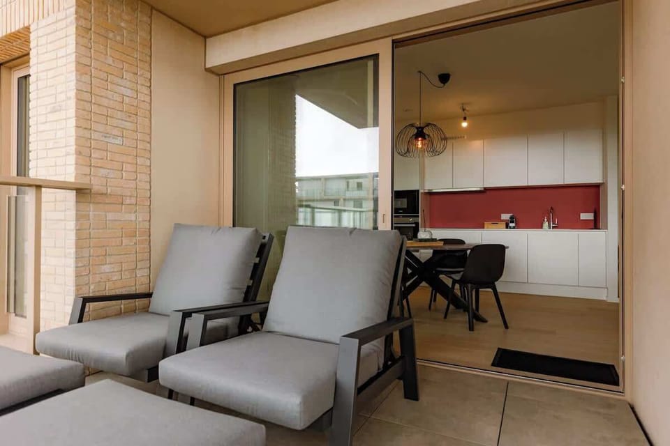 Balcony with Lounge Chairs & Views