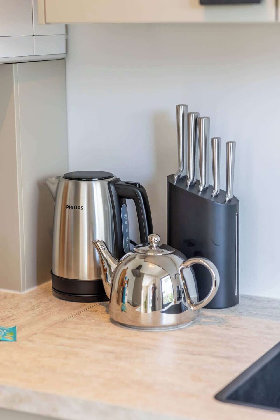 Fully equipped kitchen with modern appliances. 