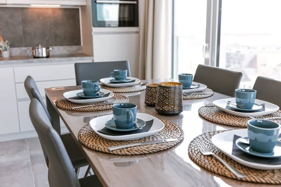 Dining area set for laughter and late dinners 