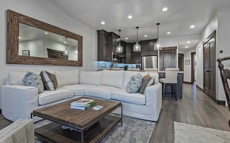 Living room with gas fireplace, TV, and comfortable seating