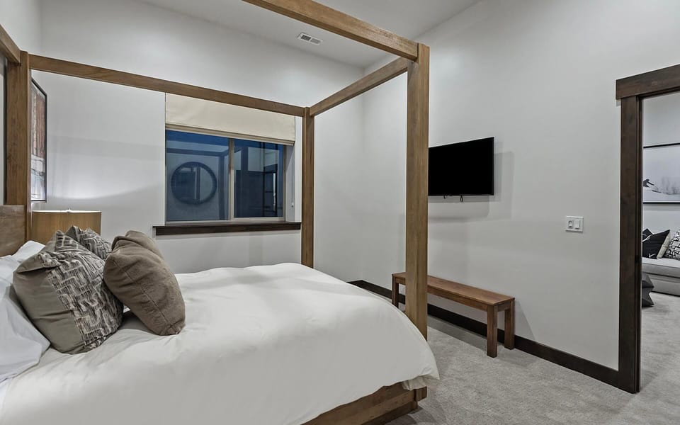 Canopy bed on lower level, queen size