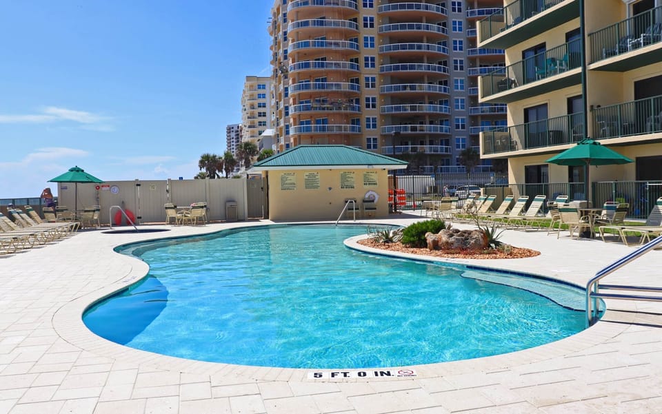 Pool view south, restrooms poolside