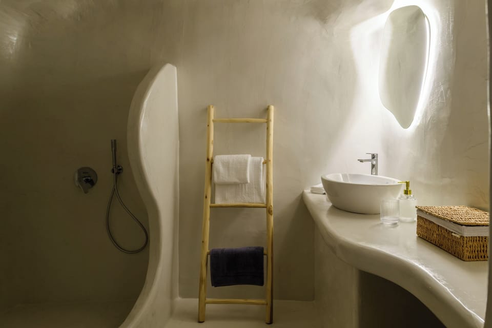 Honeymoon Double Room, Sea View | Bathroom | Shower, hair dryer, towels, soap