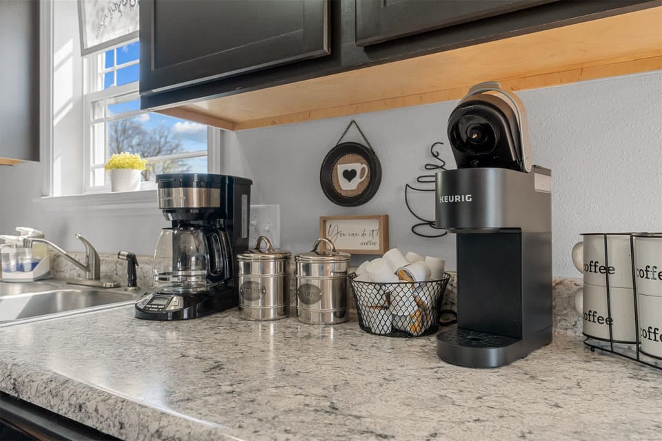 The open kitchen offers ample space & all the comforts of home​