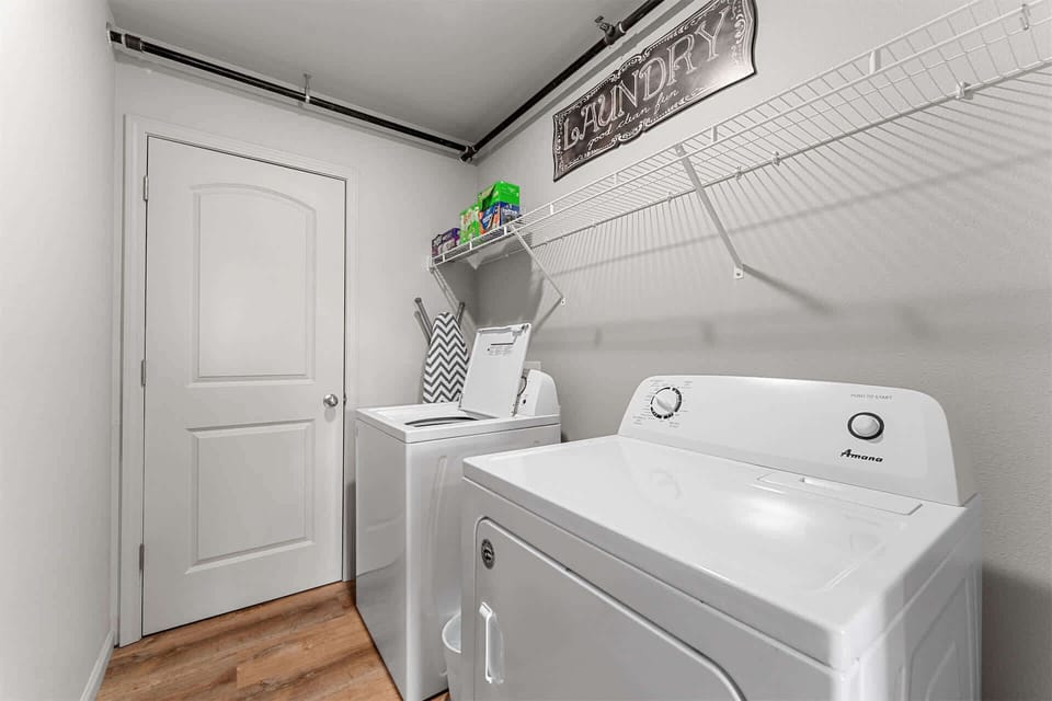 Private laundry is available for your stay, tucked away off the kitchen​
