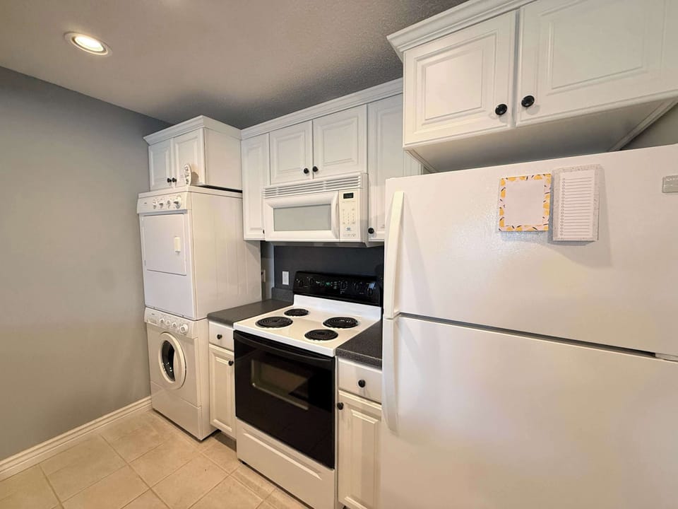 The open kitchen offers ample space & all the comforts of home​