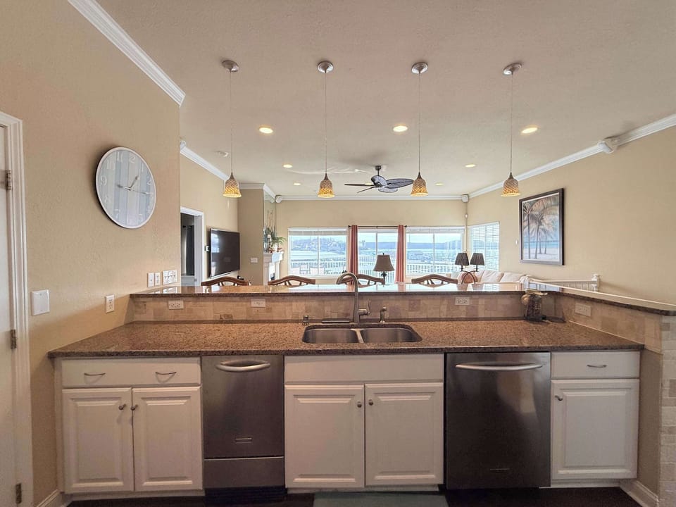 The open kitchen offers ample space & all the comforts of home​
