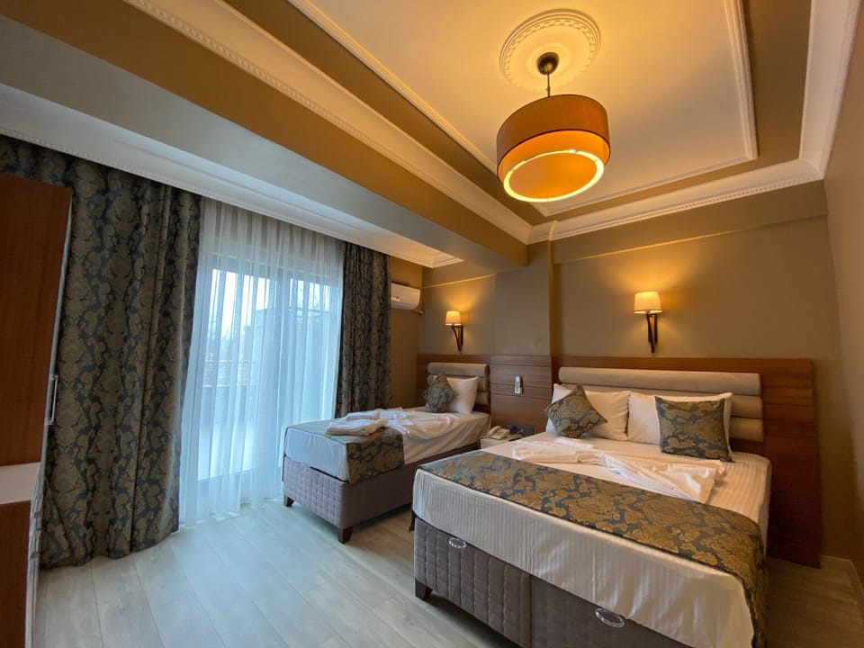 Deluxe Room, Garden View | WiFi (free), bed sheets