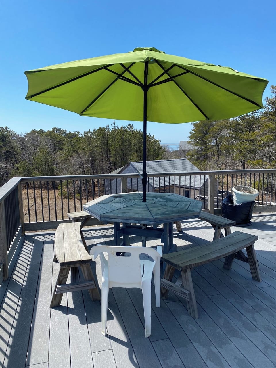 Outdoor dining, overlooking the dollhouse with view of Katama Bay