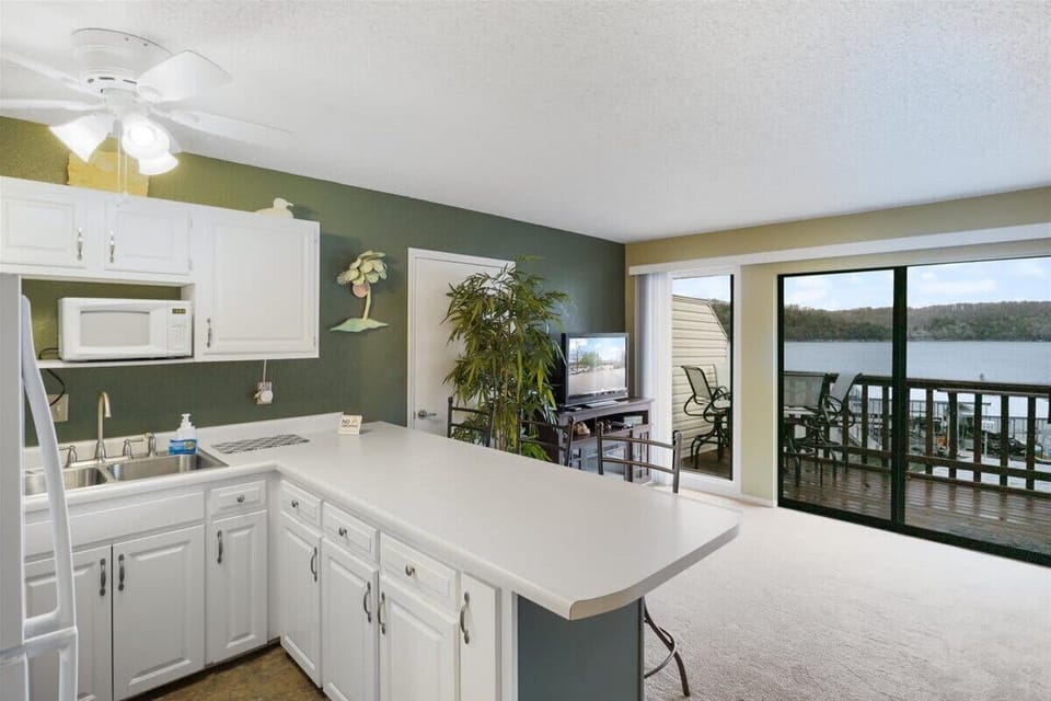 Apartment, 1 King Bed, Patio, Pool View (6620 Weston Point A3) | Private kitchen