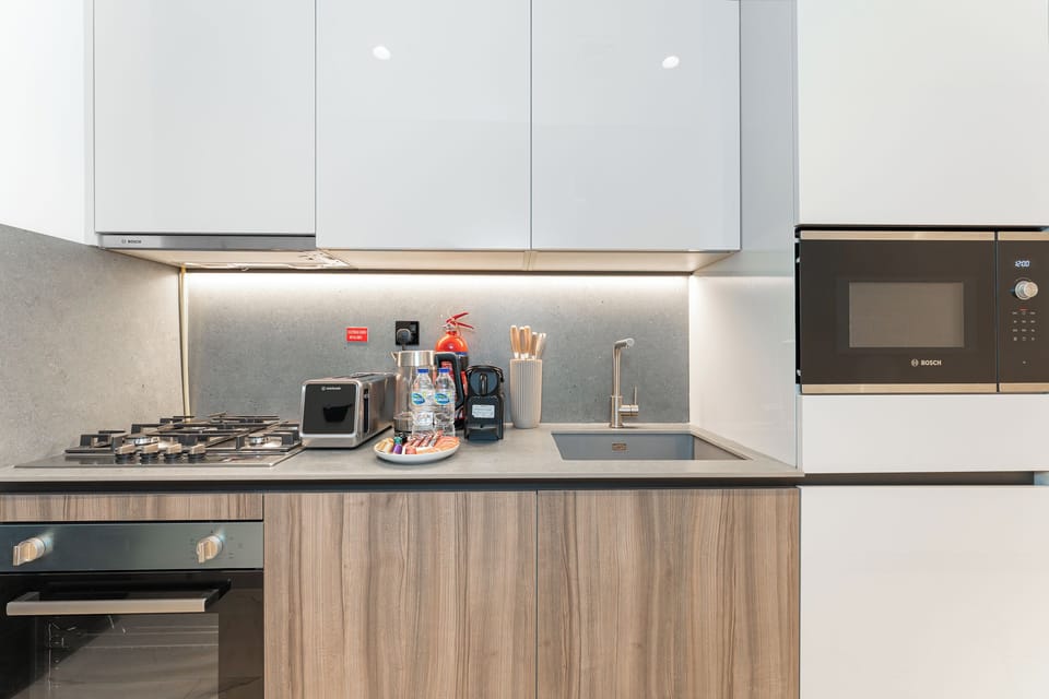 Exclusive Studio, Non Smoking, City View | Private kitchen | Full-size fridge, microwave, oven, stovetop