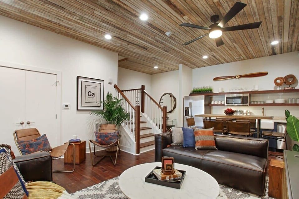 Living Room | Comfortable Seating Area and TV | First Floor of Third Floor Unit