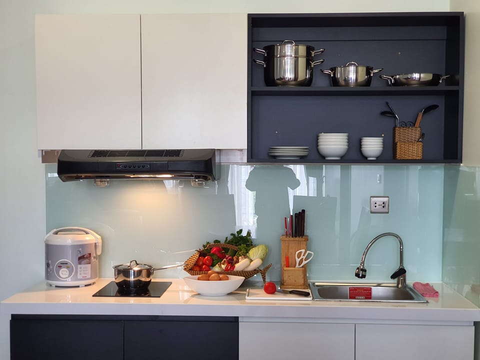Studio Suite Super King and Bunk Bed, Balcony, Garden View | Private kitchenette | Fridge, highchair