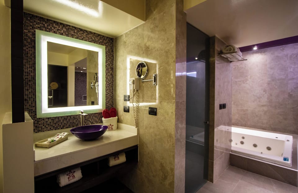 Hair dryer, towels, soap, shampoo