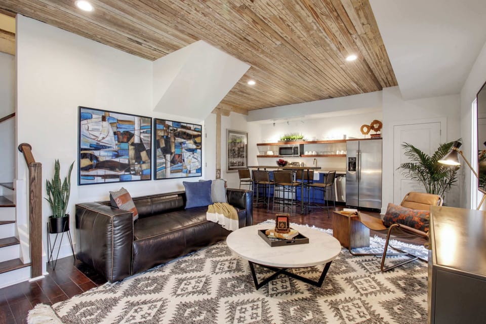 Living Room | Comfortable Seating Area and TV | First Floor of Third Floor Unit