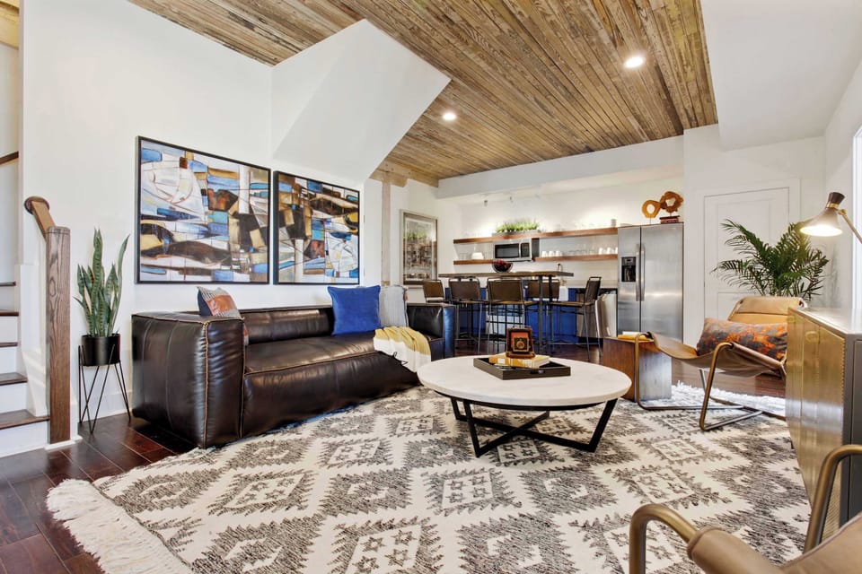 Living Room | Comfortable Seating Area and TV | First Floor of Third Floor Unit