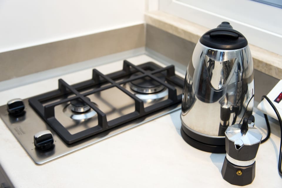 Suite executive, cucina, vista città , Edificio annesso | Private kitchenette | Espresso maker, coffee/tea maker, electric kettle